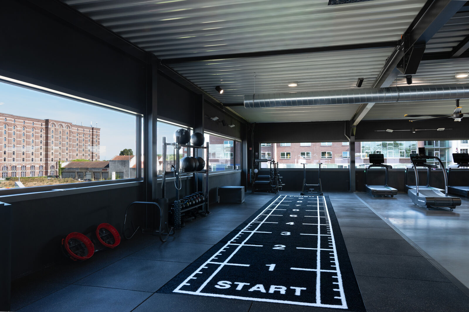 The open floor with the track beside it