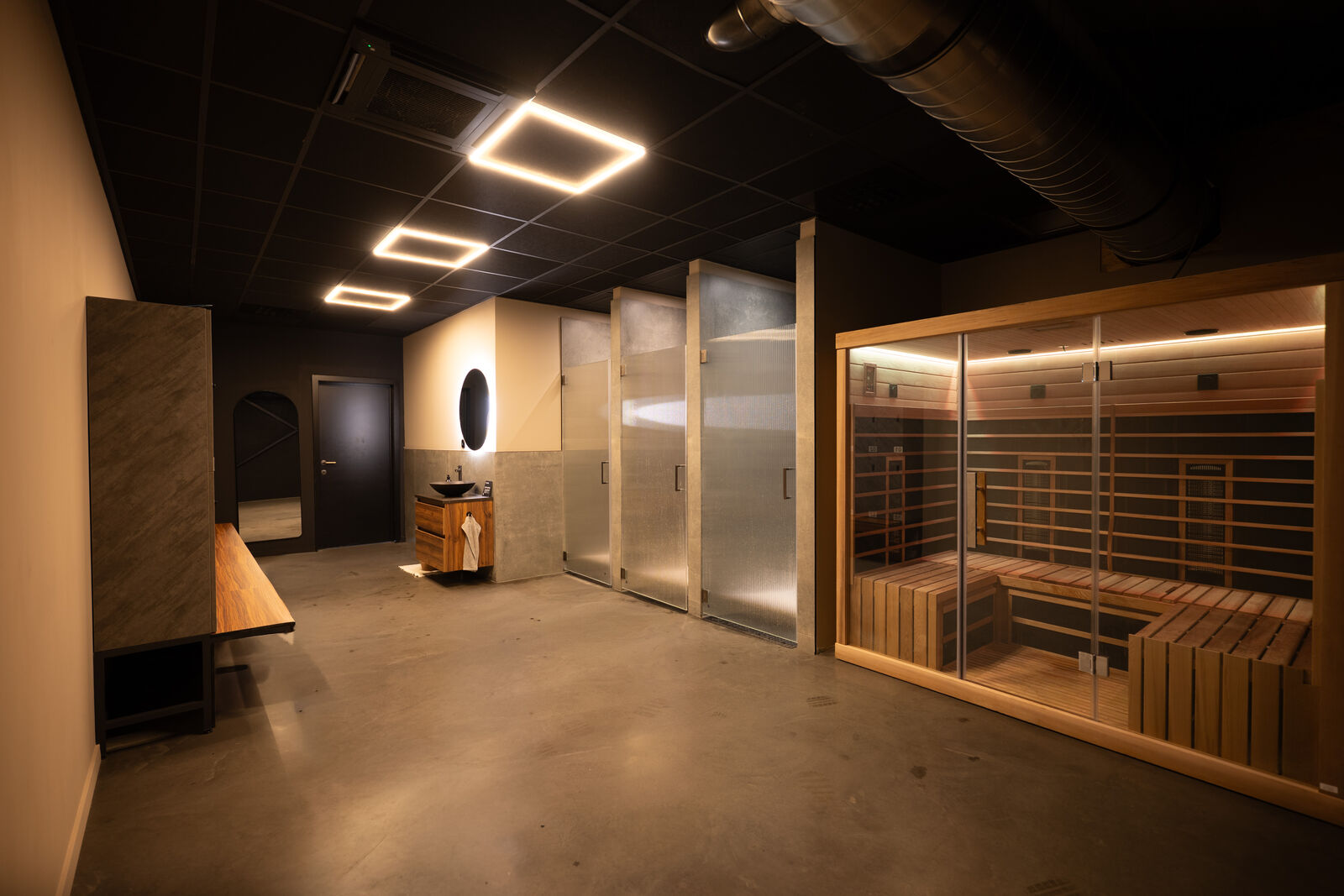 The sauna with the enclosed private showers beside it
